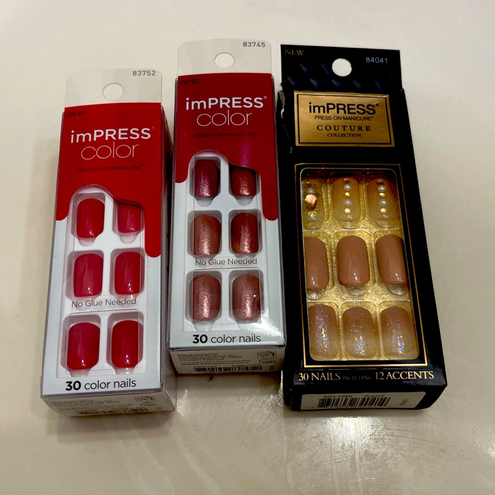 Three brand new packs of press on gel nails